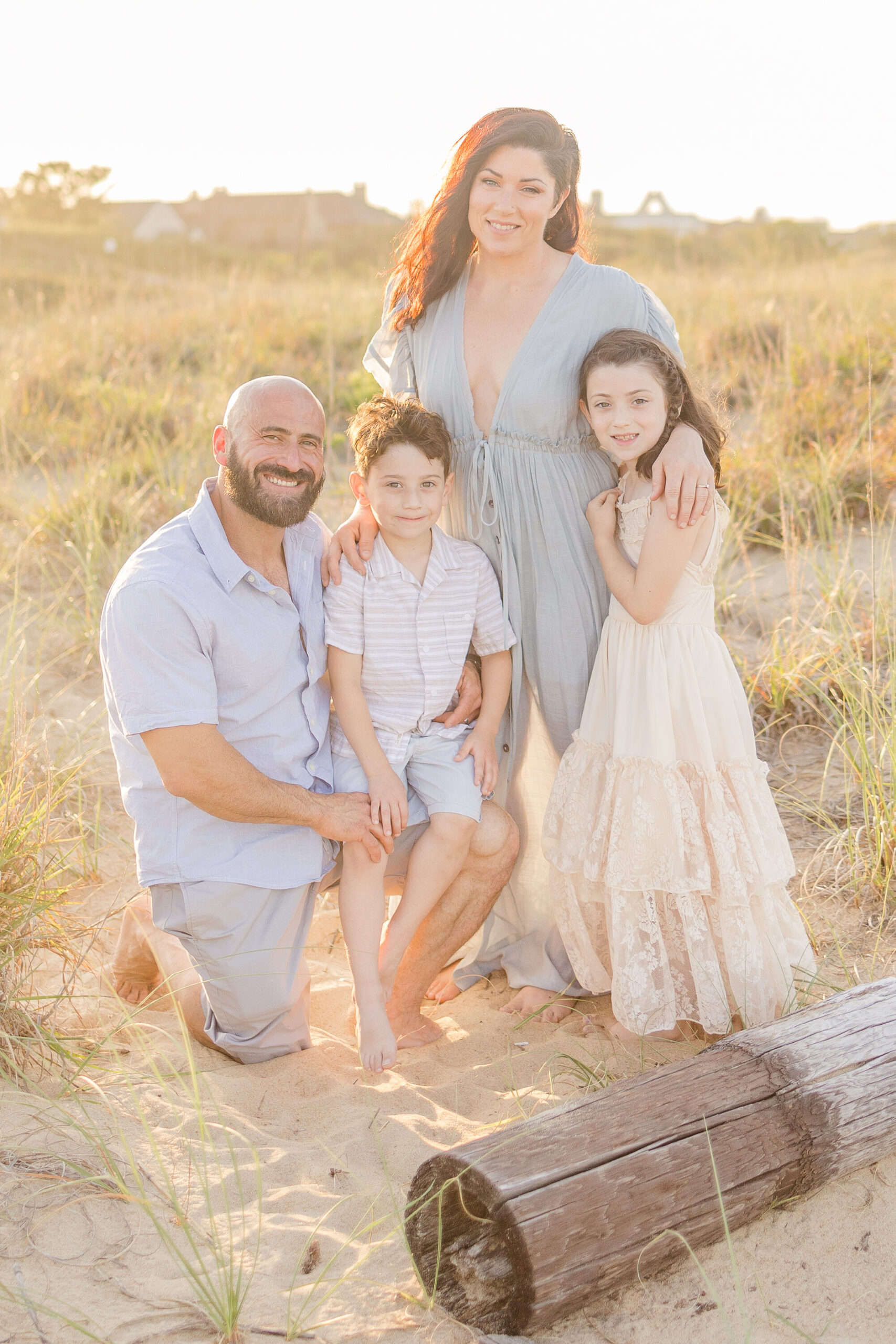 virginia beach family portrait with gorgeous neutral color clothing to be used as an example for family photo styling blog