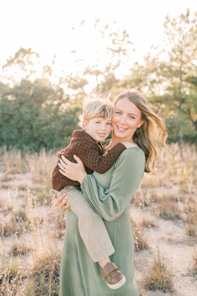 mom and son hugging and smiling