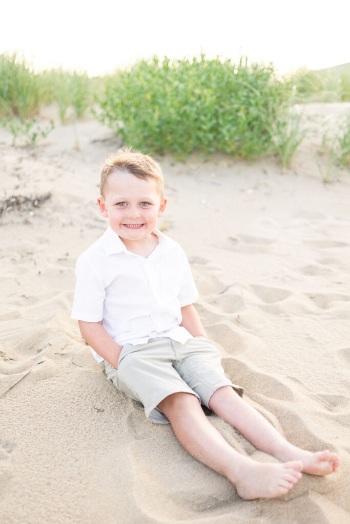 adorable portrait of toddler boy during family photos in virginia beach