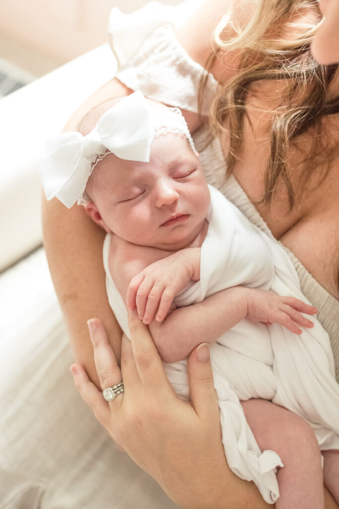 newborn baby girl during newborn photo session