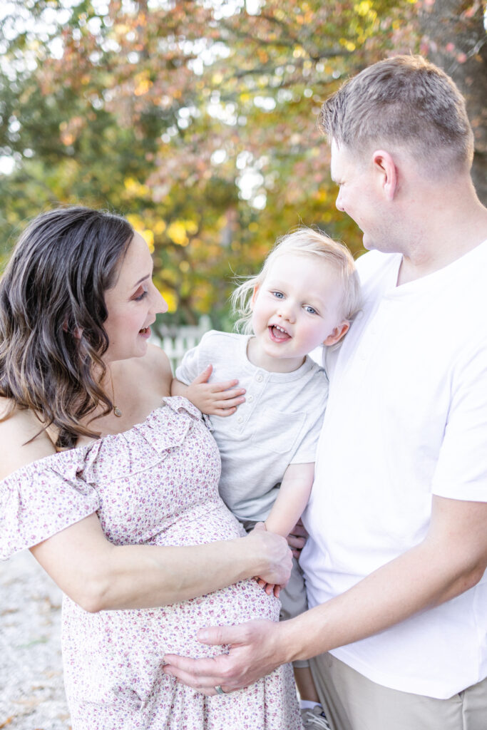 candid mother, son and father photo 