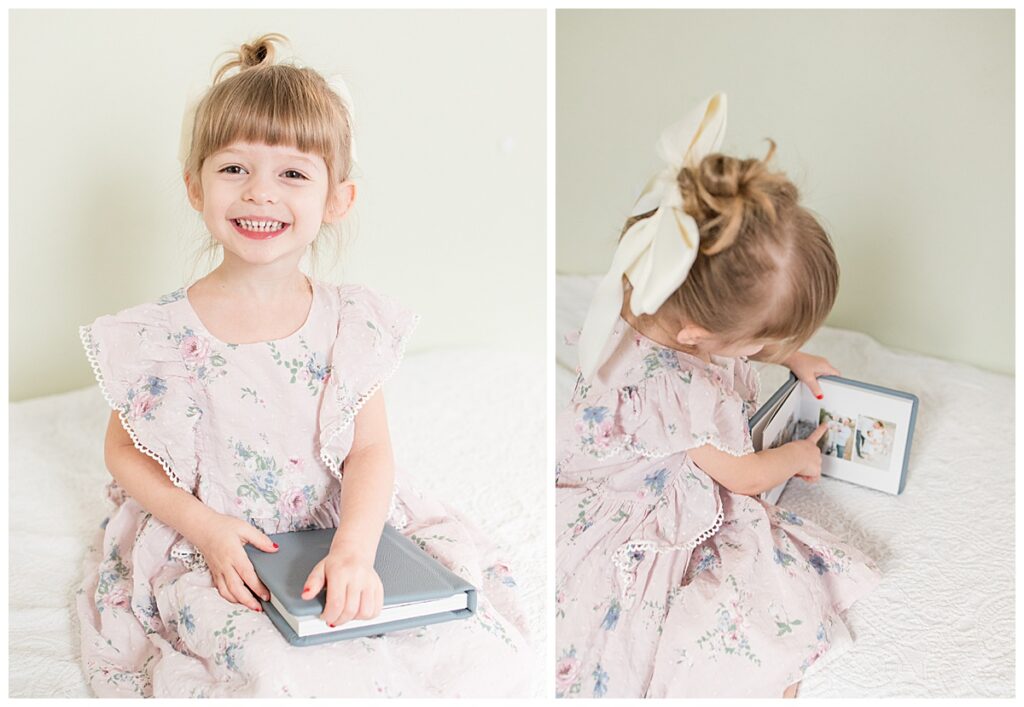 toddle girl flipping through heirloom album and smiling 