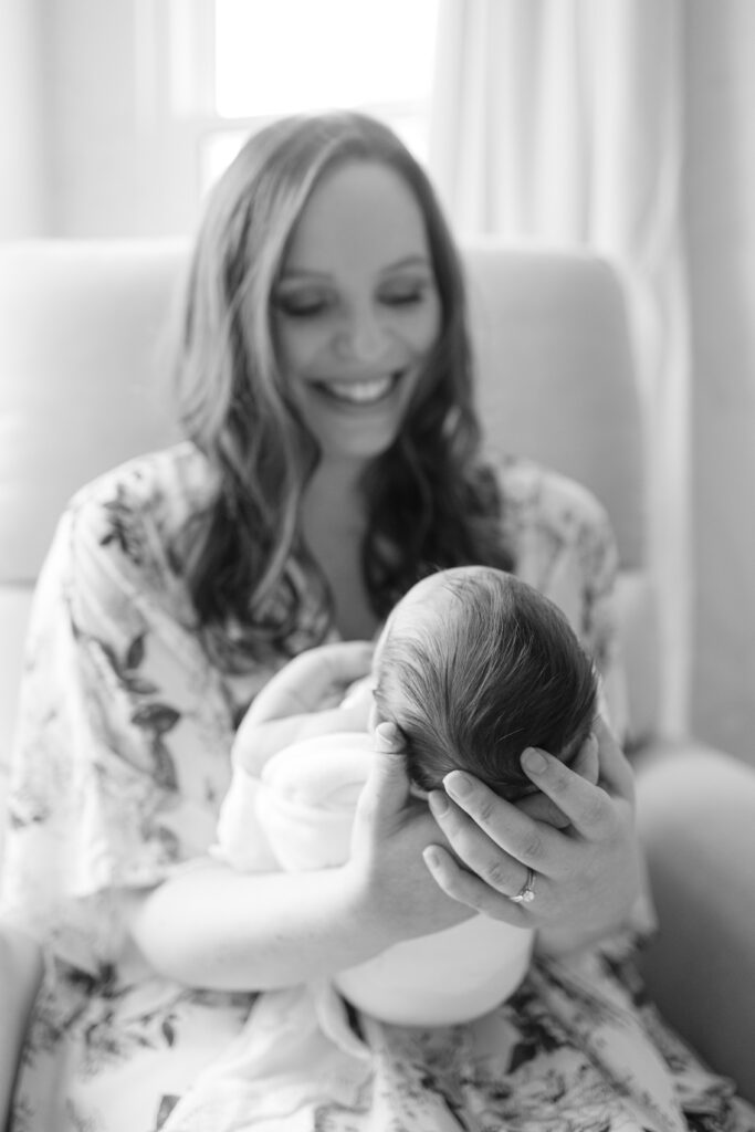 Baby Photos in Virginia Beach featuring a mom holding her newborn