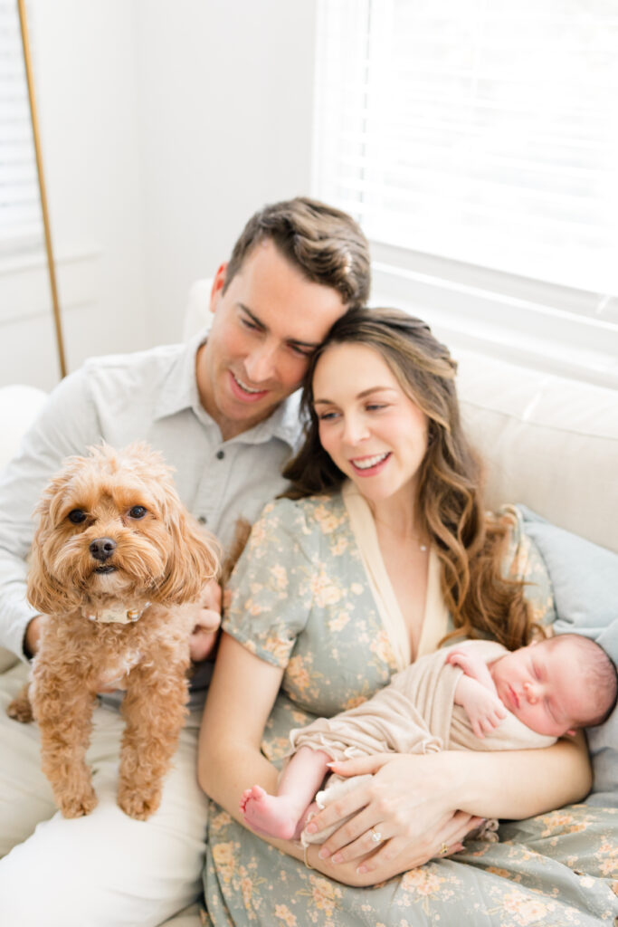 newborn photo at home with dog